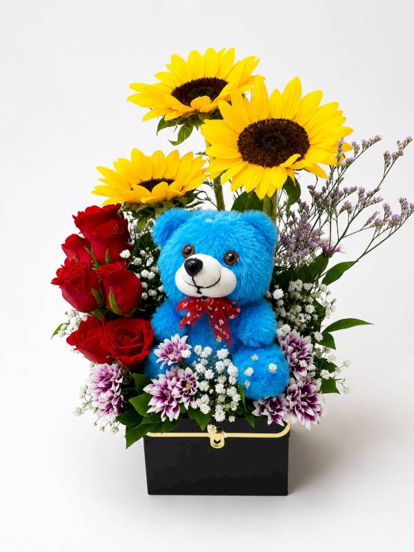 Premium roses and sunflower with teady bear centerpiece 